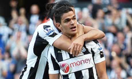 Hatem Ben Arfa gets a hug from his Newcastle United team-mate