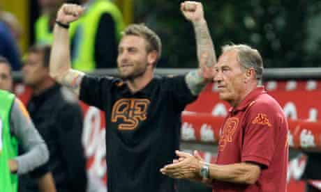 Roma coach Zdenek Zeman, right, applauds with  midfielder Daniele De Rossi after beating Inter