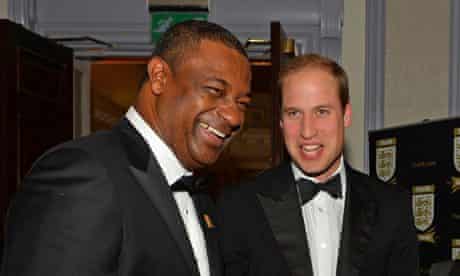 Fifa vice-president Jeffrey Webb, left, talking to Prince William at the FA 150th anniversary dinner