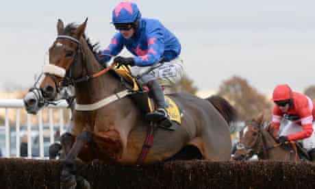 Cue Card and Joe Tizzard on their way to a decisive victory in the Betfair Chase at Haydock Park