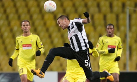 Newcastle's Danny Simpson heads the ball during the Europa League first leg against Anzhi