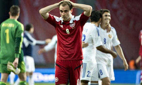 Christian Eriksen reacts after Denmark lost 4-0 at home to Armenia in Copenhagen