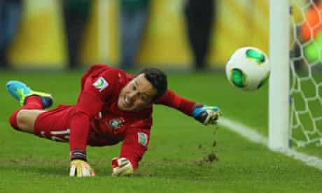 Julio Cesar saves a penalty in the Confederations Cup semi-final