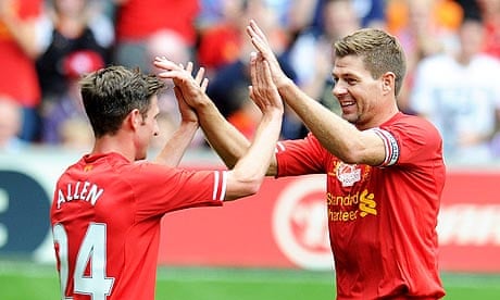 Liverpool's Steven Gerrard congratulates Joe Allen on opening the scoring against Olympiakos