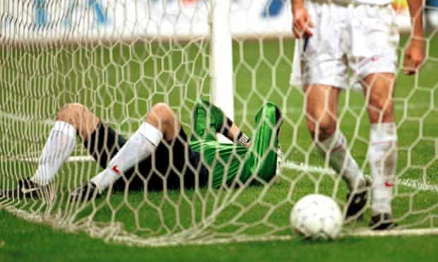 Russia's goalkeeper Alexander Filimonov lies in his goal after conceding to Ukraine