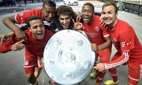 Bayern Munich's players celebrate winning the Bundesliga title