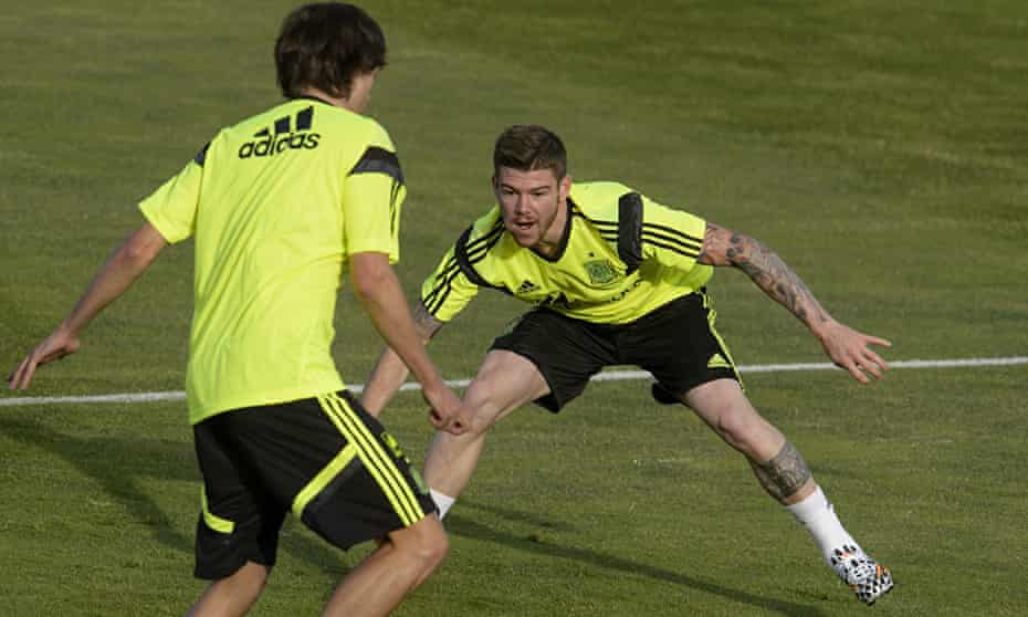 Alberto Moreno, right, takes part in a Spain training session