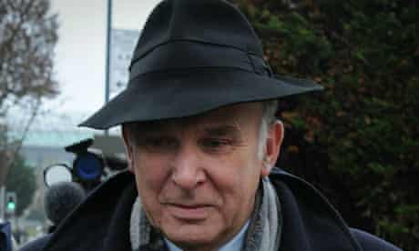 Vince Cable in hat