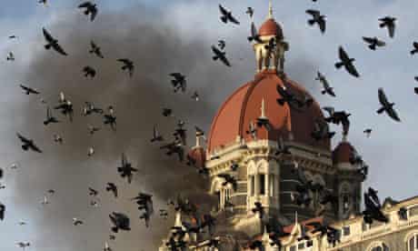 The Taj Mahal Hotel in Mumbai on fire after terror attacks