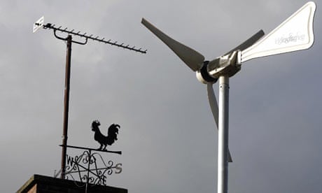 A wind turbine sits on the roof of Ashton Hayes Primary School, in Ashton Hayes, near Chester