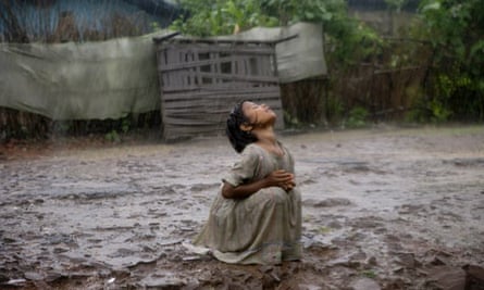 A young girl in the monsoon rains of Bhopal
