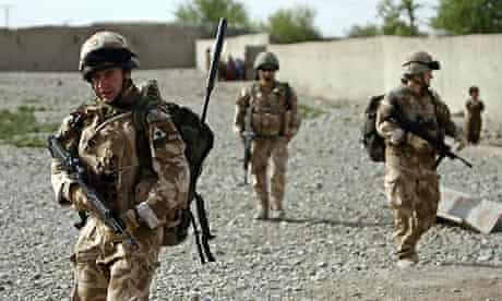 British soldiers on a joint foot patrol with US Marines in Musa Qala, Afghanistan