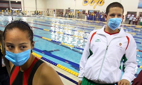 Swine flu Mexican athletes wear masks