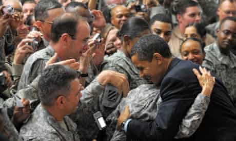 Barack Obama greets troops during a visit to Camp Victory, just outside Baghdad