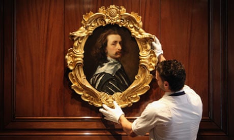A Sotheby's employee with a painting by Sir Anthony Van Dyck
