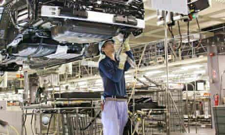 (FILE) A worker at Japan's auto giant To