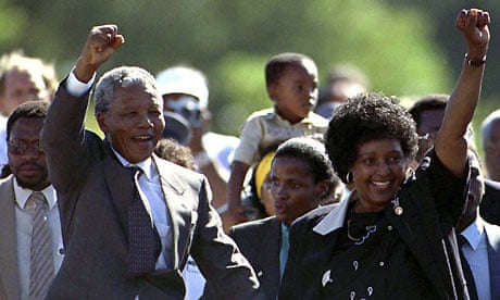 Nelson Mandela is accompanied by his wife Winnie, after his release from Victor Verster prison