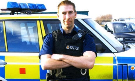 Greater Manchester Police officers at crime scene