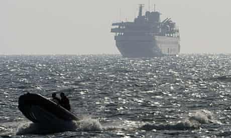 Gaza flotilla lead ship Mavi Marmara escorted by speedboat near Ashdod
