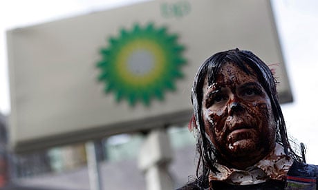A protester demonstrates at a BP petrol station in Manhattan