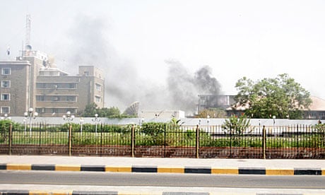 Smoke rises from police compound in the southern Yemeni port city of Aden