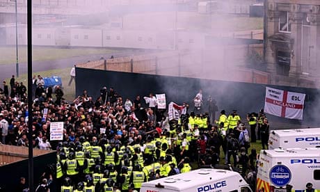 EDL supporters are held in by police in Bradford during a demonstration.