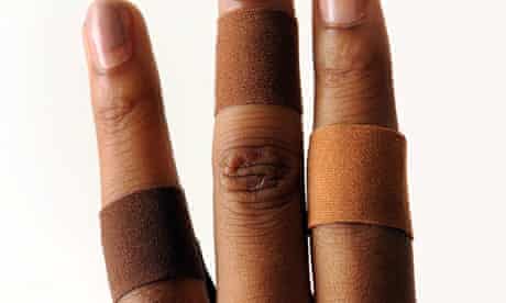 Sticking plasters that match different skin tones.