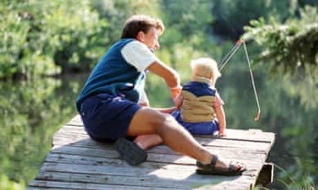 A father and son go fishing. Up to 40% of divorcing dads lose all contact with their children