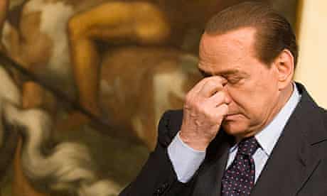 Silvio Berlusconi reflects during a press conference in Rome.