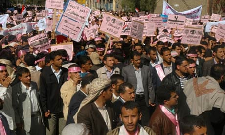 Yemenis attend a protest in Sana'a