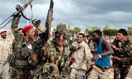 Anti-Gaddafi fighters celebrate Sirte