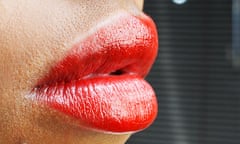 A woman wearing red lipstick