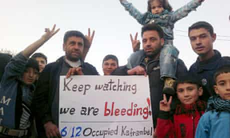 Demonstrators protesting against al-Assad in Kafranbel earlier this month