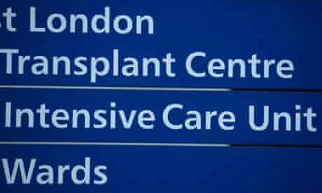 Signs for the transplant centre, intensive care unit and wards at the Hammersmith Hospital 