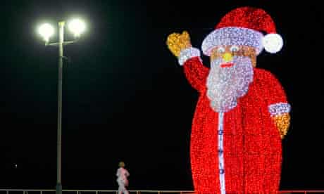 A giant, illuminated Santa Claus