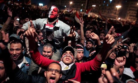 Egyptians celebrate the news of the resignation of Hosni Mubarak