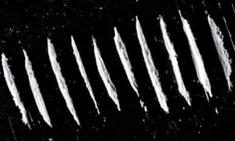 image of lines of cocaine powder on black surface