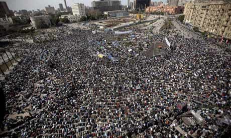 Egyptian anti-government protesters pray