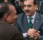 Pakistan's prime minister, Yusuf Raza Gilani, consoles relatives of Shahbaz Bhatti