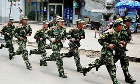 Chinese police officers on the streets of Hohhot, Inner Mongolia.  