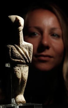 British Museum employee Esme Wilson with marble Cycladic figurine