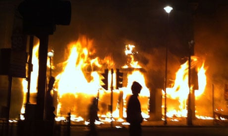 A shop burns on Tottenham High Road