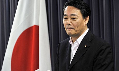 Japan's trade minister Banri Kaieda says he will sack three officials over nuclear policy, in Tokyo.