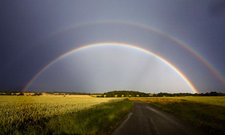 A double rainbow over fields of crops in Hoxne, Suffolk