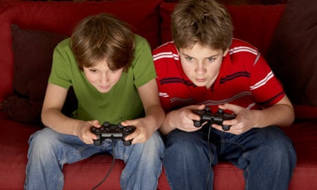 teenage boys playing computer games