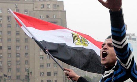 A protester in Cairo's Tahrir Square shouts anti-military government slogans, January 2012