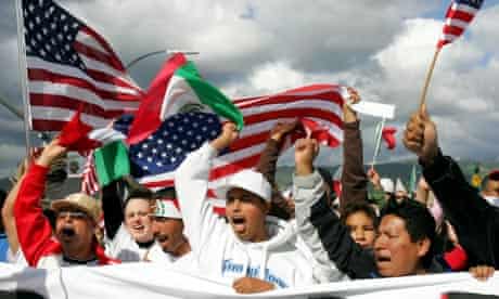 People cheer during a rally for citizenship for illegal immigrants, California, 2006