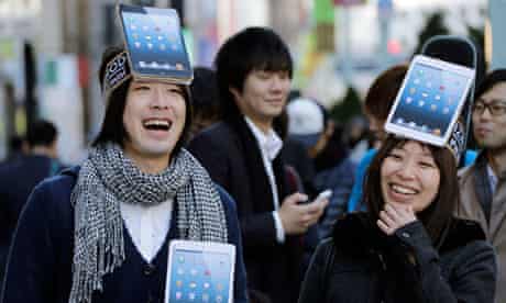 Apple fans queue for the iPad mini
