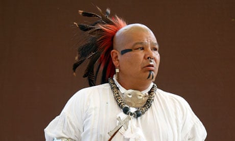 A Cherokee man in traditional costume