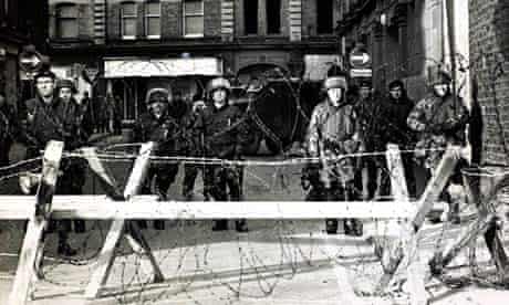 British troops behind a wire barricade in Derry, on Bloody Sunday